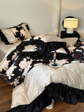 Load image into Gallery viewer, Retro French jacquard cotton polished four-piece set autumn and winter thickened pure cotton black gold printing quilt cover bedding