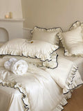 Load image into Gallery viewer, French high-grade long-staple cotton cotton four-piece set, pure cotton jacquard quilt cover, girl's heart lace solid color bed sheet, bedding