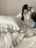 Load image into Gallery viewer, French simple cotton double-layer yarn four-piece set, black lace pure cotton quilt cover, retro niche premium bedding