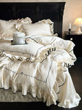 Load image into Gallery viewer, Summer light luxury premium cream wind Tencel cool feeling four-piece French embroidery silky sleeping quilt cover bedding